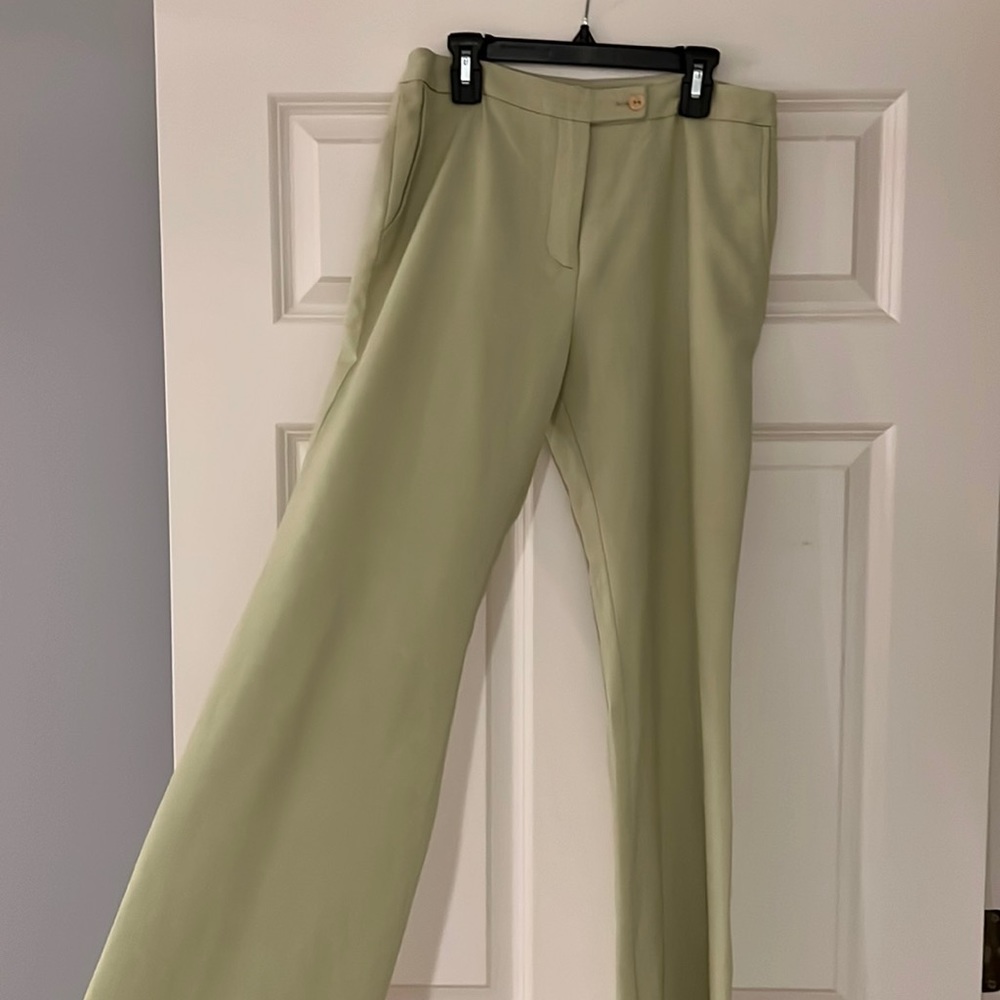 The color is a lighter, less harsh green in person.